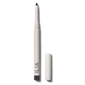 White ILIA eyeliner pencil with black tip and cap on white background