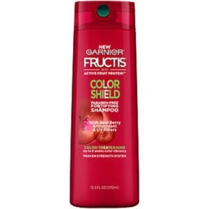 Red Garnier Fructis Color Shield shampoo bottle with green cap