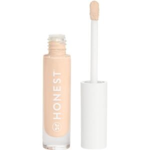 Honest brand concealer with applicator, beige liquid, and white cap