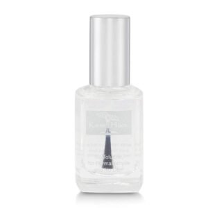 Clear Karma Hues nail polish bottle with silver cap, close-up shot