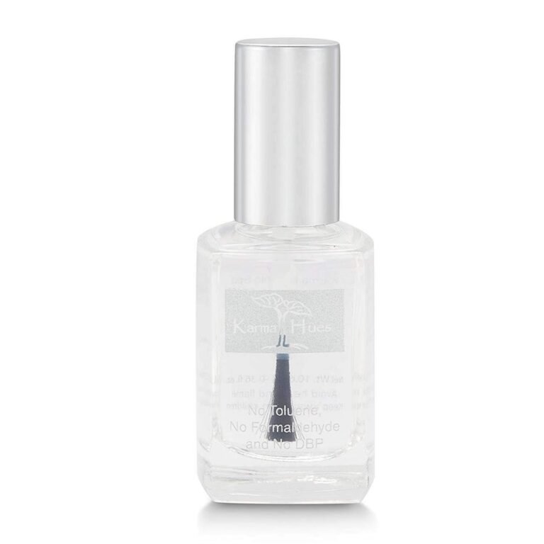 Clear Karma Hues nail polish bottle with silver cap, close-up shot