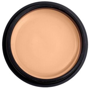 Close-up of a round compact of beige foundation in a black case