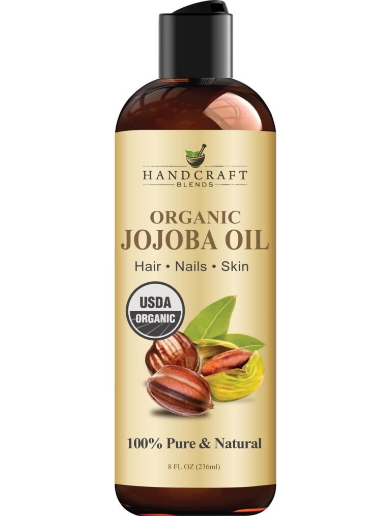 Bottle of Handcraft Blends organic jojoba oil with jojoba seeds