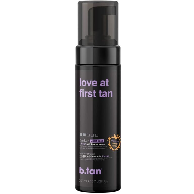 Black bottle of "love at first tan" self-tanning mousse with purple text