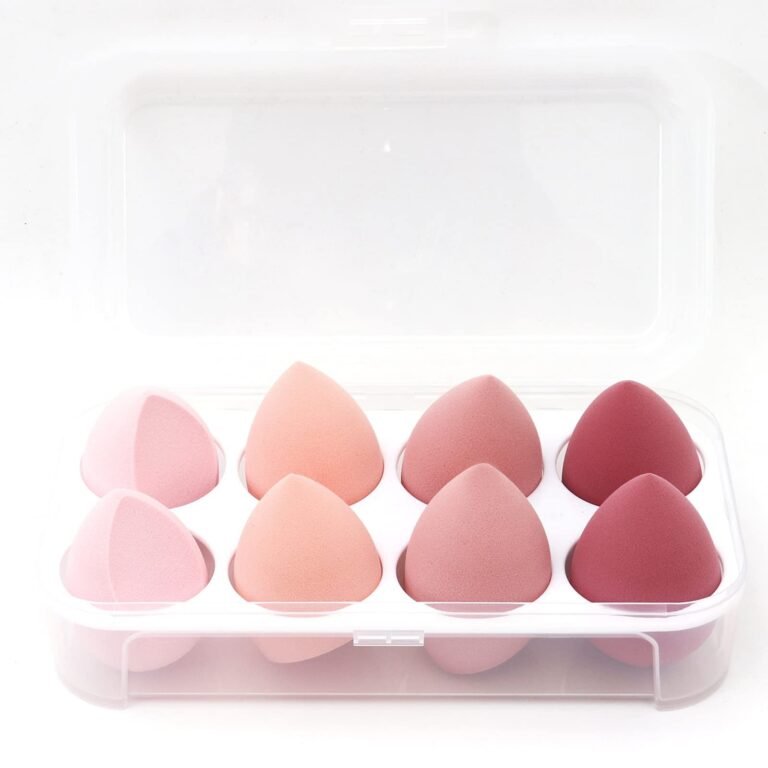 Eight pink and red teardrop-shaped makeup sponges in a clear plastic case