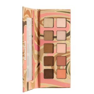 Open eyeshadow palette with ten neutral shades and a decorative cover