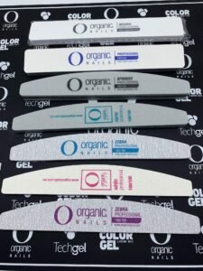 Assortment of Organic Nails brand nail files in various shapes and grits